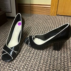 Black and white Franco Sarto open-toe heels in good condition.